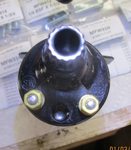 Photo of the Q12 Lucas coil with terminals marked &quot;SW&quot; and &quot;CB&quot;